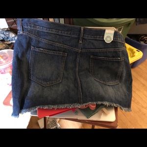 New with tags, worn looking denim skirt